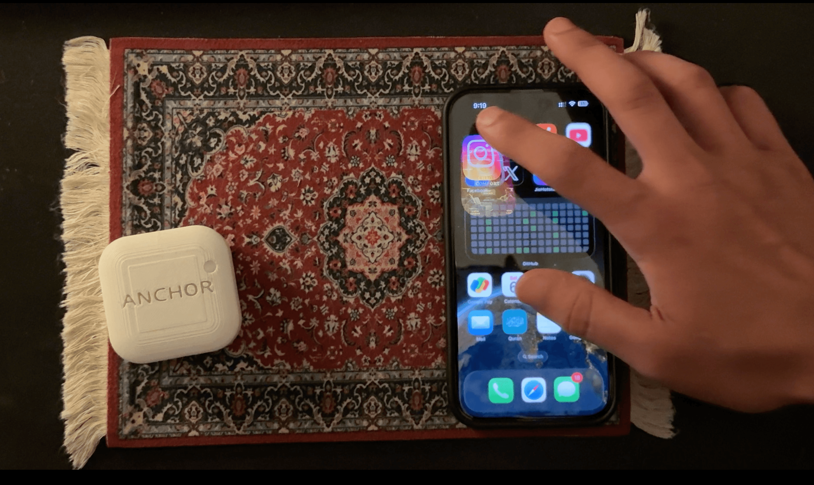 Demo video showing the Anchor device next to an iPhone on a work surface